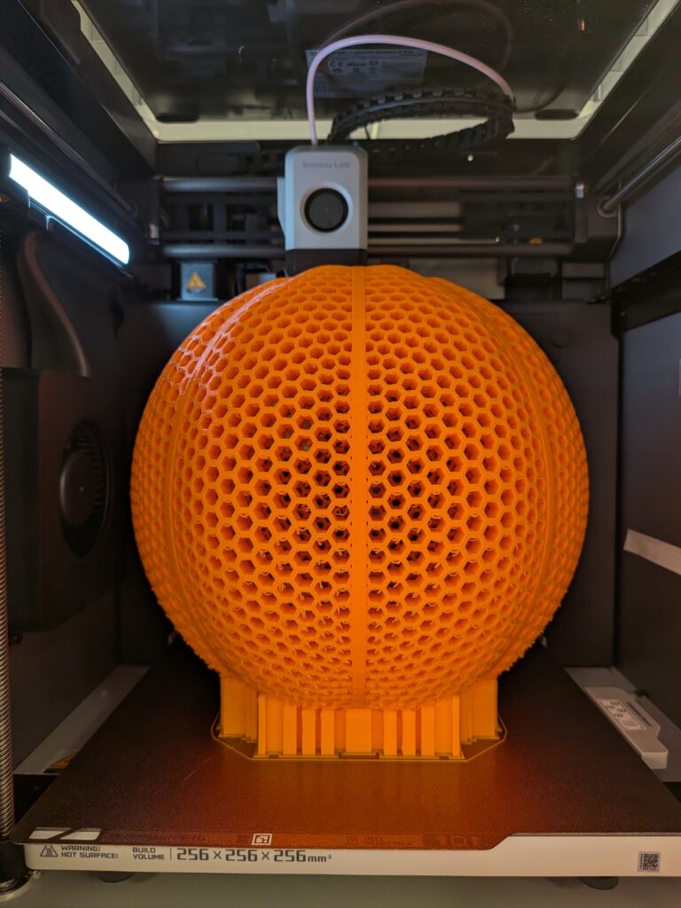 Close up of the Airless Basketball in the 3D printer.
