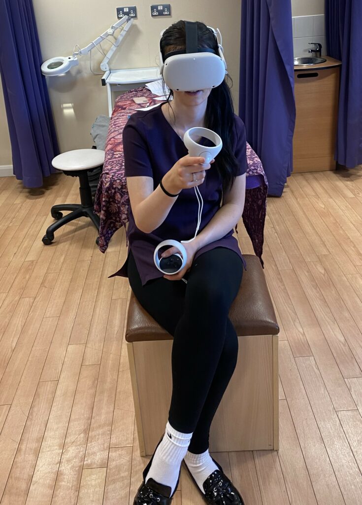 A student wearing a virtual reality headsets in a beauty salon